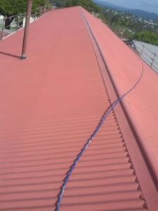 School roof before cool roof painting