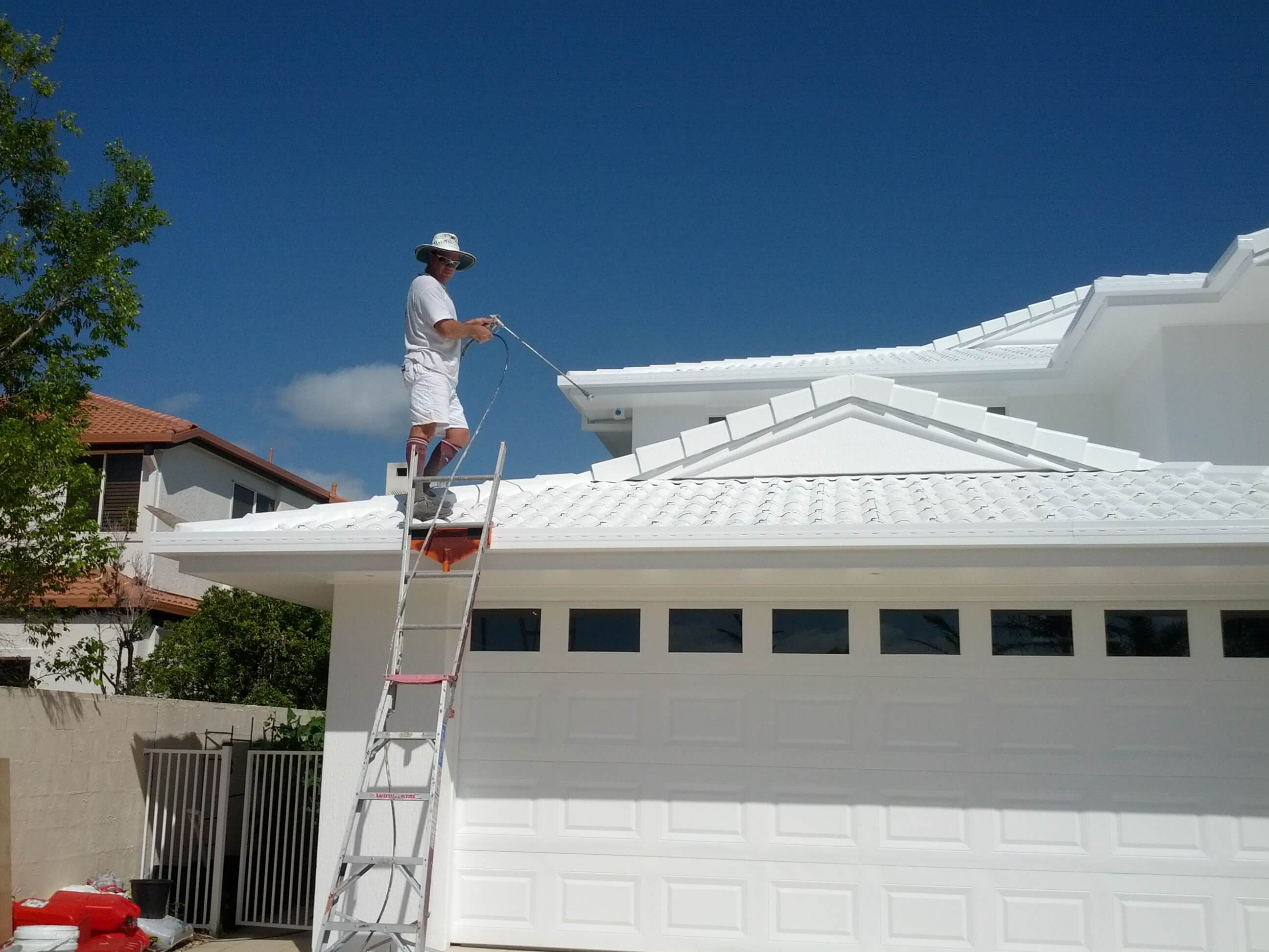 Painting a cool roof
